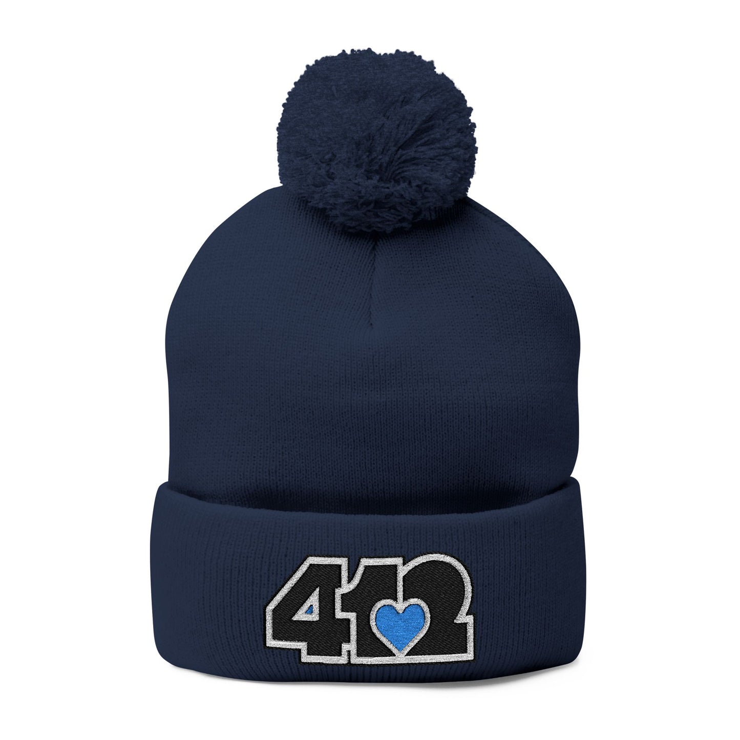 Cozy 412 Tossle Cap | Embroidered Black and Blue Logo. Apparel Color: Navy. Has soft acrylic knit, fold-over cuff, and one-size fit for winter comfort.