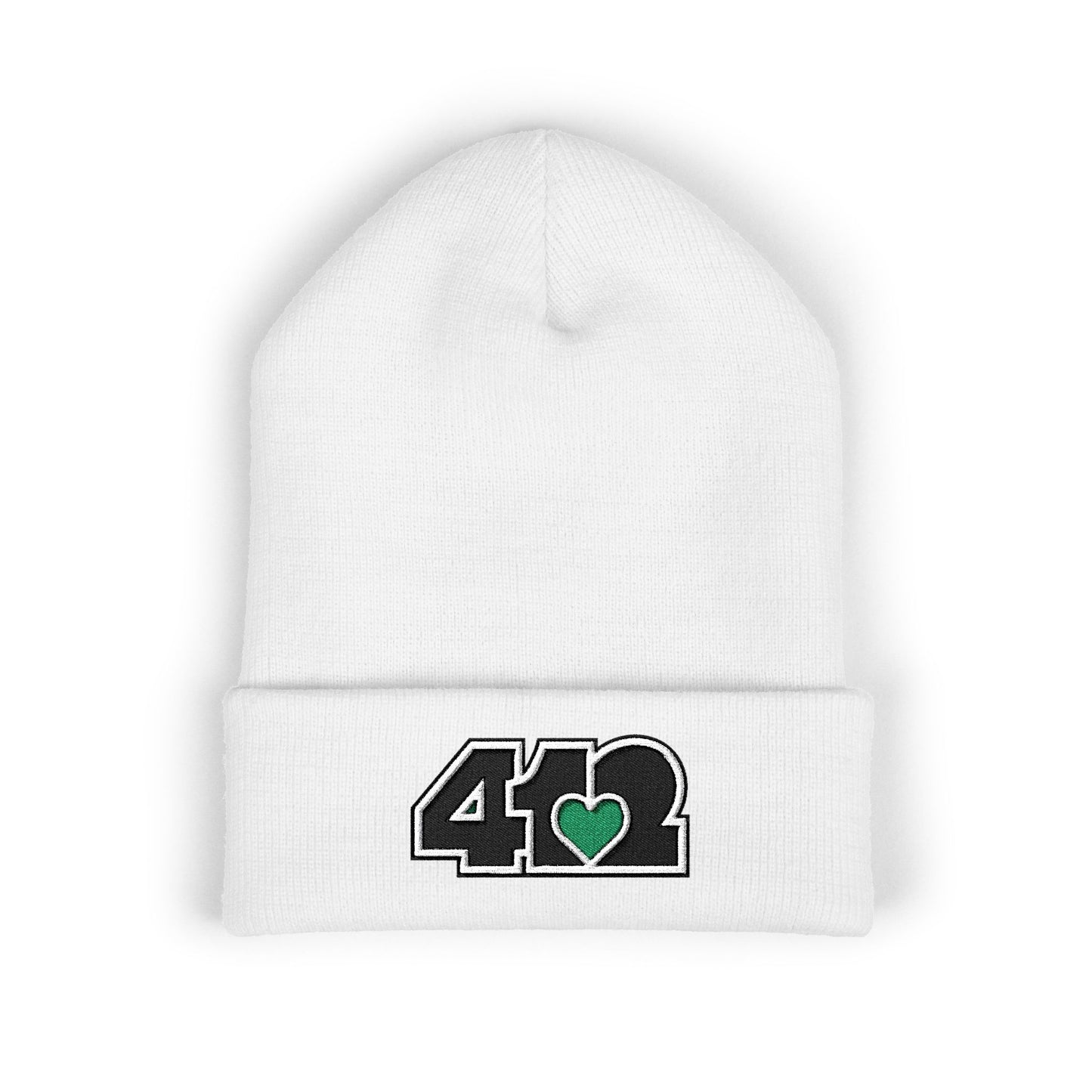 White 412 Skull Crown beanie with green heart embroidery and black logo. Pittsburgh-born streetwear merging Yinzer energy, and bold urban style.