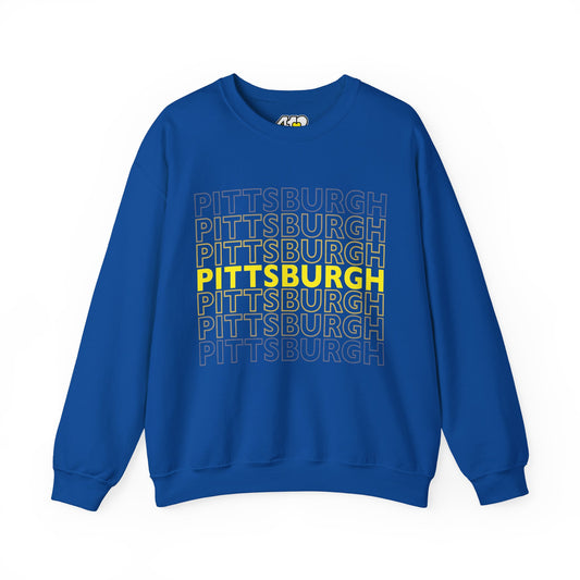 Pittsburgh Crewneck | On Repeat. Apparel Color: Royal. A blend of 50% cotton and 50% polyester for cozy durability. With an Elastic ribbed collar, and Double-needle stitching.