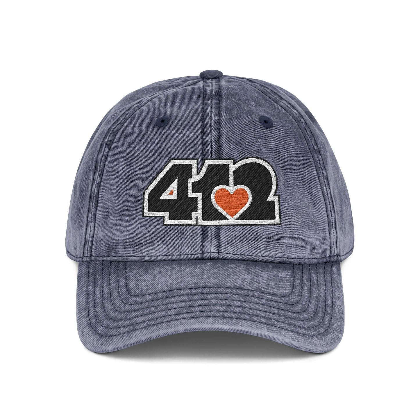 Pittsburgh Vintage Hat | Embroidered Black and Orange 412 Logo. Apparel Color: Navy. A relaxed fit, cotton twill fabric, adjustable buckle, and washed-out finish look.
