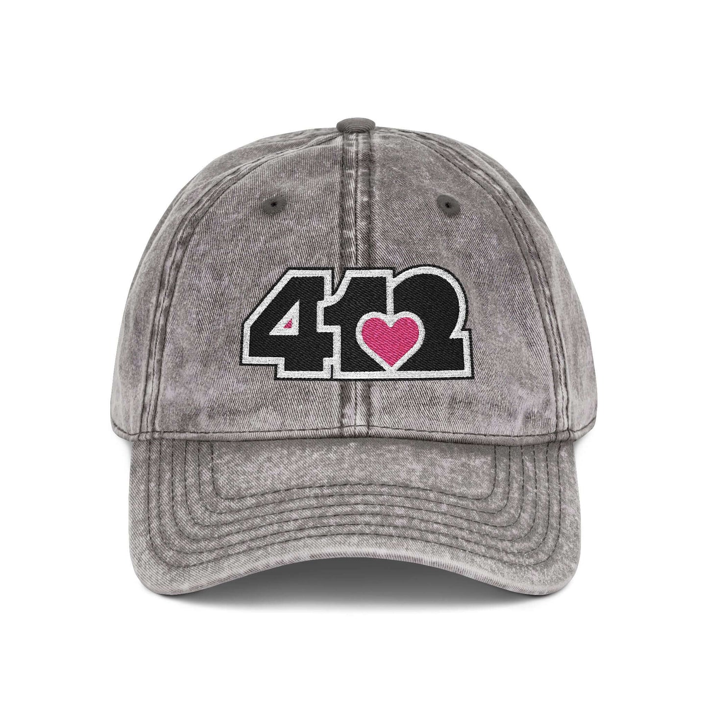 Pittsburgh Vintage Hat | Embroidered Black and Pink 412 Logo. Apparel Color: Charcoal Grey. A relaxed fit, cotton twill fabric, adjustable buckle, and washed-out finish look.