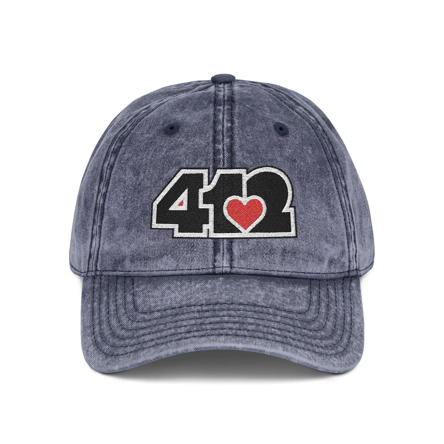 Pittsburgh Vintage Hat | Embroidered Black and Red 412 Logo. Apparel Color: Navy. A relaxed fit, cotton twill fabric, adjustable buckle, and washed-out finish look.