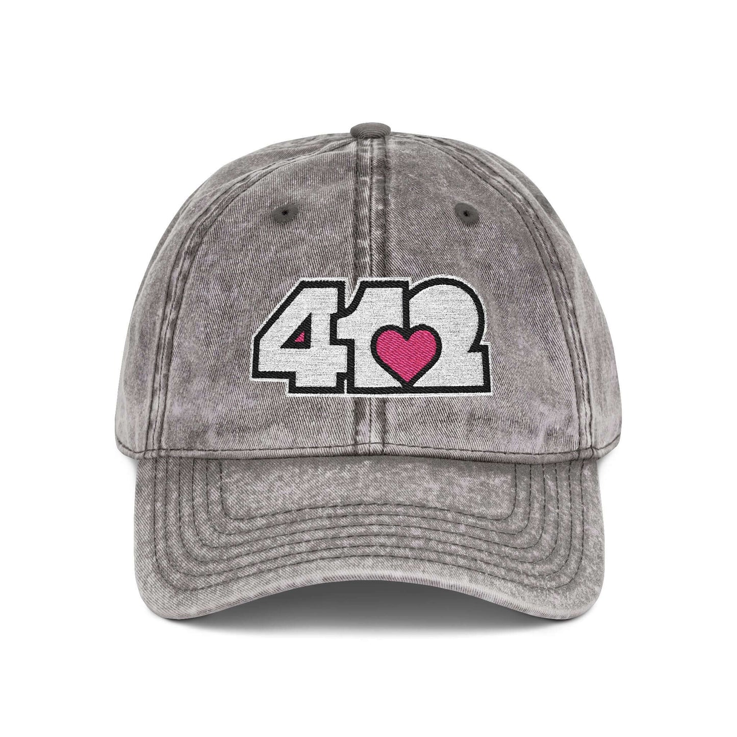 Pittsburgh Vintage Hat | Embroidered White and Pink 412 Logo. Apparel Color: Charcoal Grey. A relaxed fit, cotton twill fabric, adjustable buckle, and washed-out finish look.