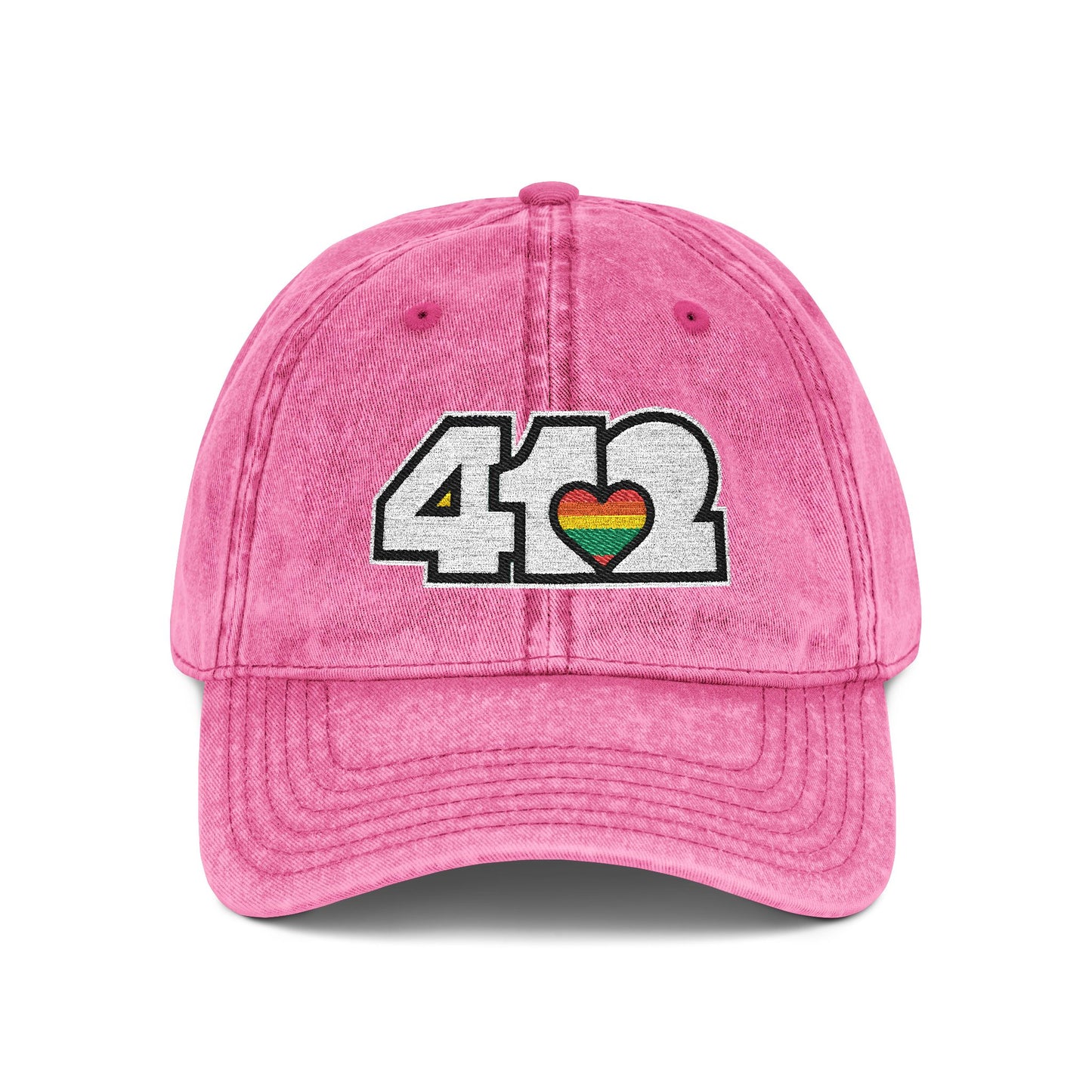 Pittsburgh Vintage Hat | Embroidered White and Rainbow 412 Logo. Apparel Color: Pink. A relaxed fit, cotton twill fabric, adjustable buckle, and washed-out finish look.