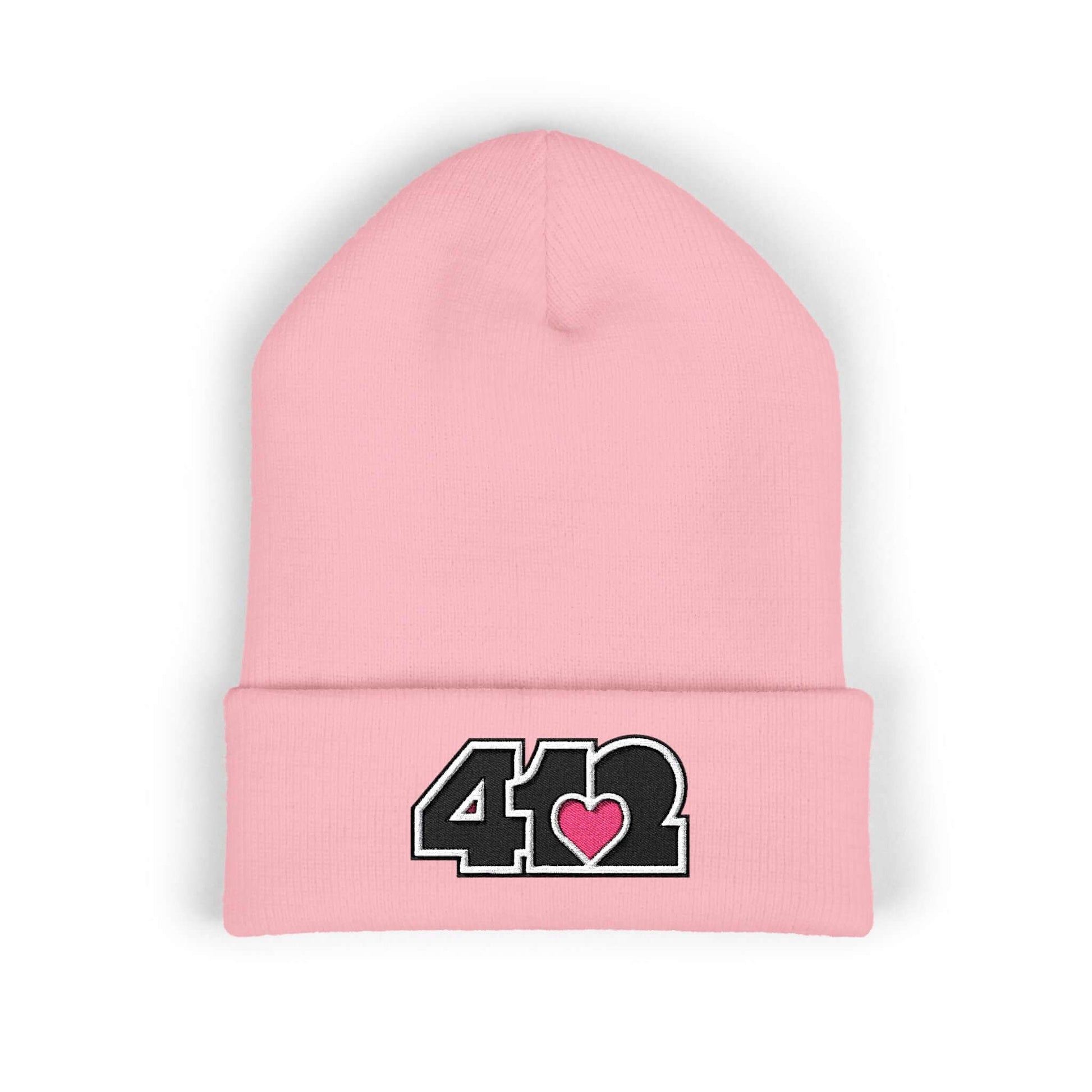 Cozy 412 Cuffed Beanie Hat | Embroidered Black and Pink Logo. Apparel Color: Baby Pink. Featuring a snug cuffed fit, and soft acrylic for winter style.