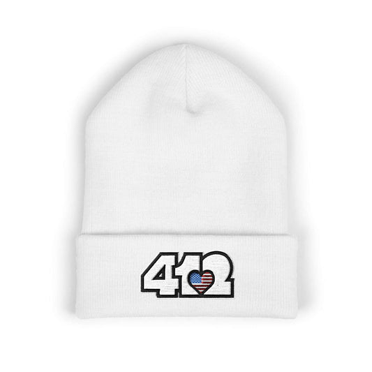 Cozy 412 Cuffed Beanie Hat | Embroidered Stars & Stripes White Logo. Apparel Color: White. Featuring a snug cuffed fit, and soft acrylic for winter style.