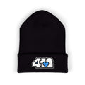 Cozy 412 Cuffed Beanie Hat | Embroidered White and Blue Logo. Apparel Color: Black. Featuring a snug cuffed fit, and soft acrylic for winter style.