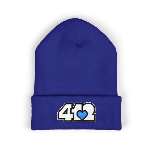 Cozy 412 Cuffed Beanie Hat | Embroidered White and Blue Logo. Apparel Color: Royal. Featuring a snug cuffed fit, and soft acrylic for winter style.