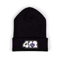 Cozy 412 Cuffed Beanie Hat | Embroidered White and Purple Logo. Apparel Color: Black. Featuring a snug cuffed fit, and soft acrylic for winter style.