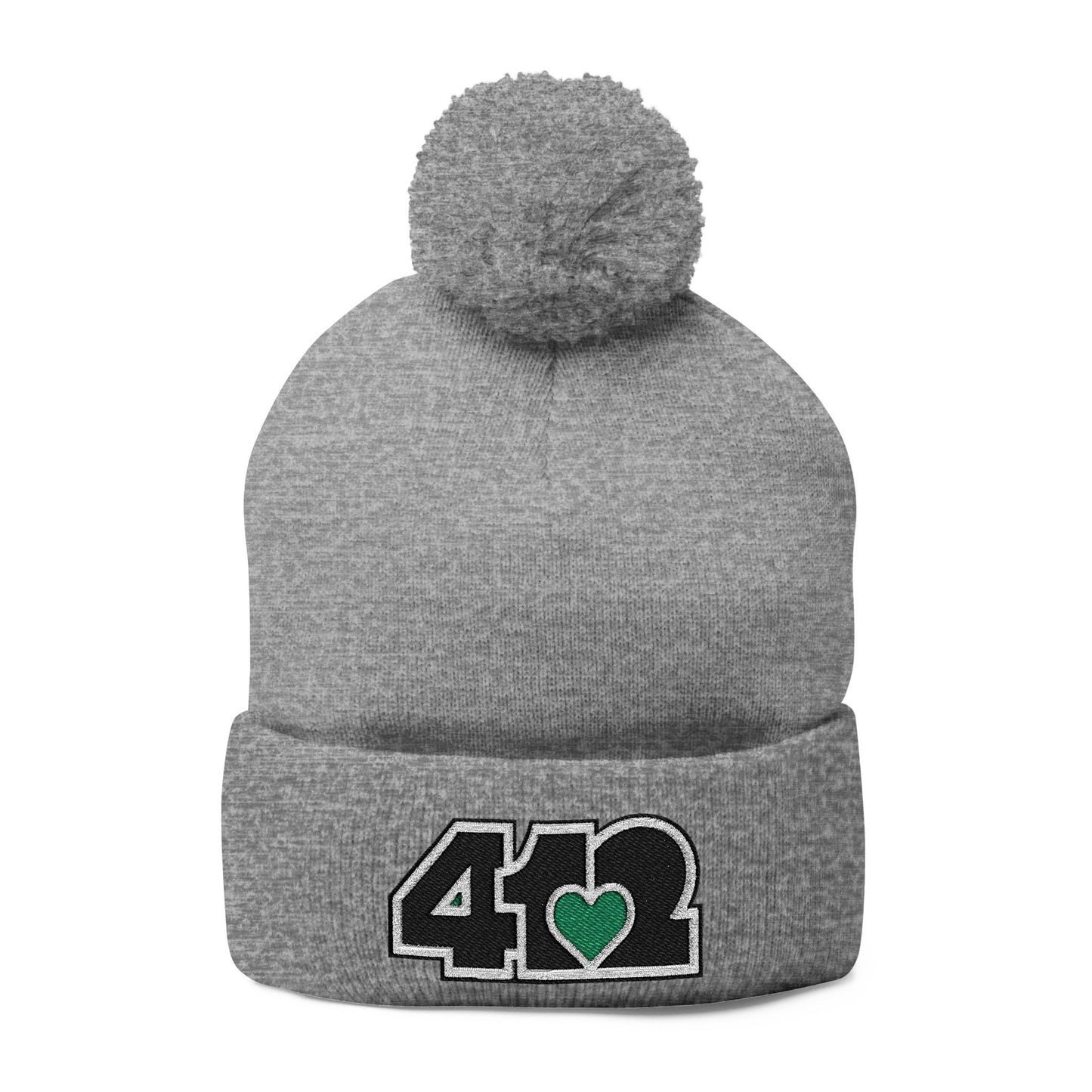 Cozy 412 Tossle Cap | Embroidered Black and Green Logo. Apparel Color: Heather Grey. Has soft acrylic knit, fold-over cuff, and one-size fit for winter comfort.