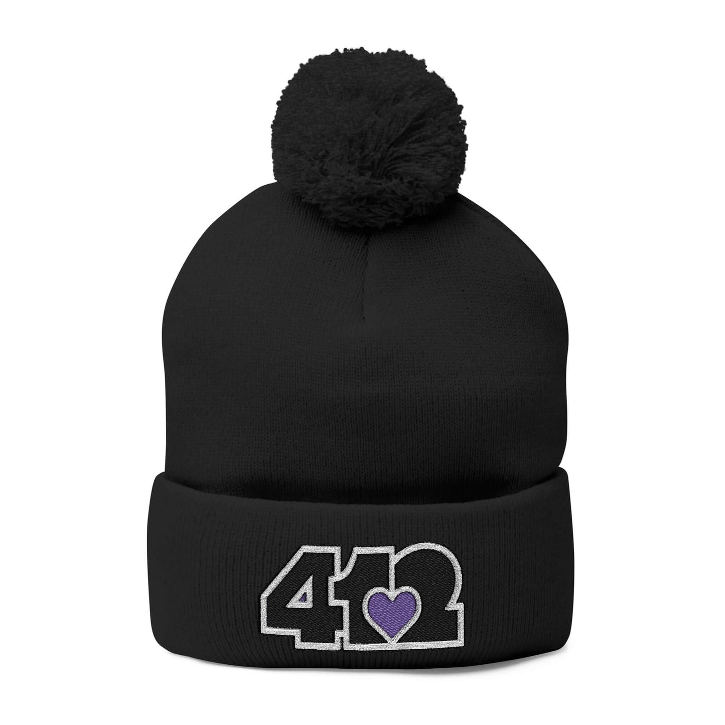 Cozy 412 Tossle Cap | Embroidered Black and Purple Logo. Apparel Color: Black. Has soft acrylic knit, fold-over cuff, and one-size fit for winter comfort.