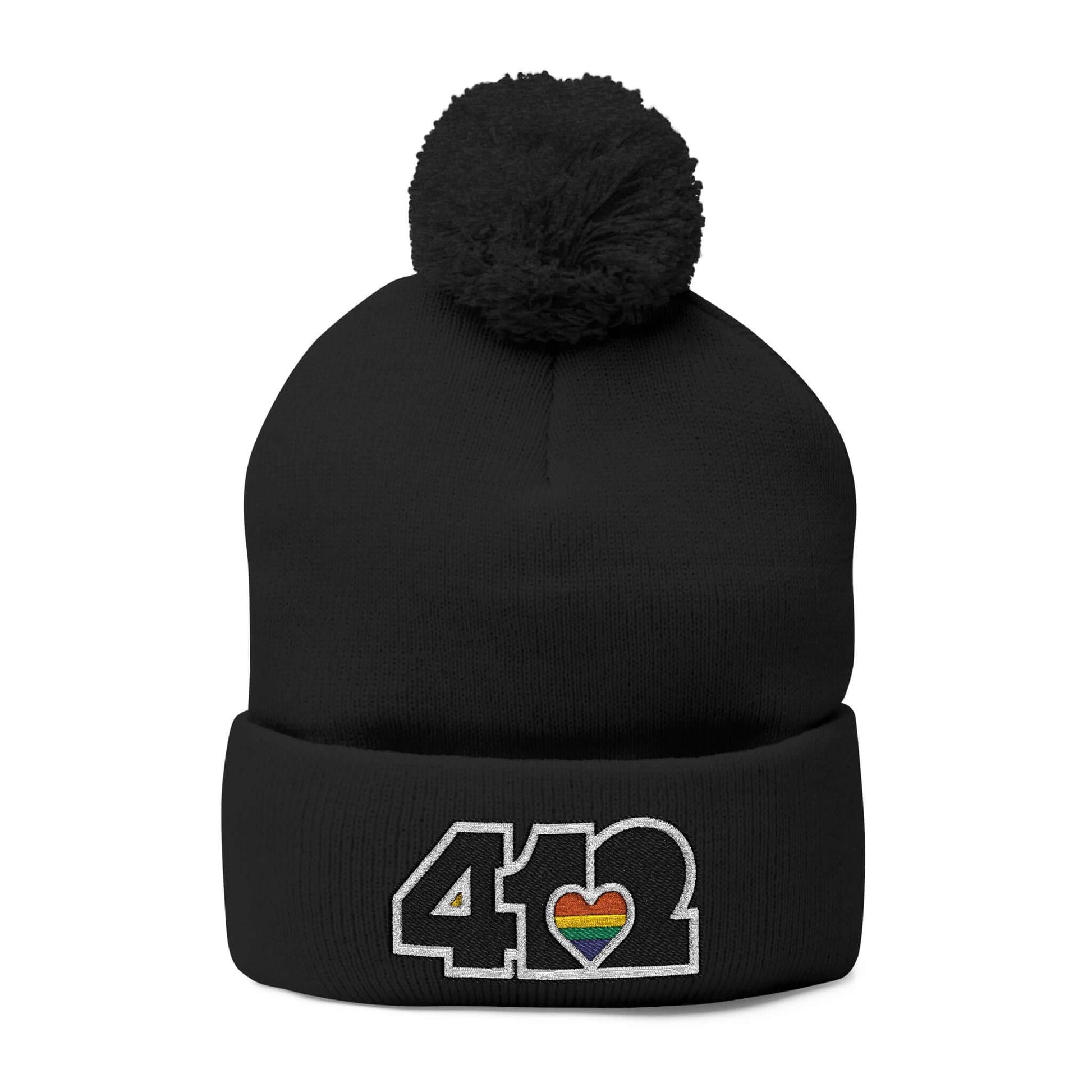 Cozy 412 Tossle Cap | Embroidered Black and Rainbow Logo. Apparel Color: Black. Has soft acrylic knit, fold-over cuff, and one-size fit for winter comfort.