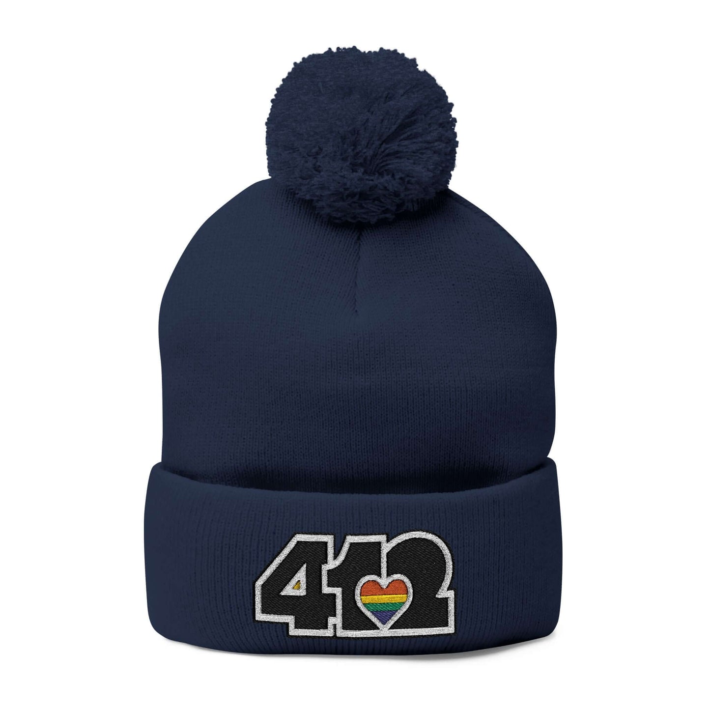 Cozy 412 Tossle Cap | Embroidered Black and Rainbow Logo. Apparel Color: Navy. Has soft acrylic knit, fold-over cuff, and one-size fit for winter comfort.