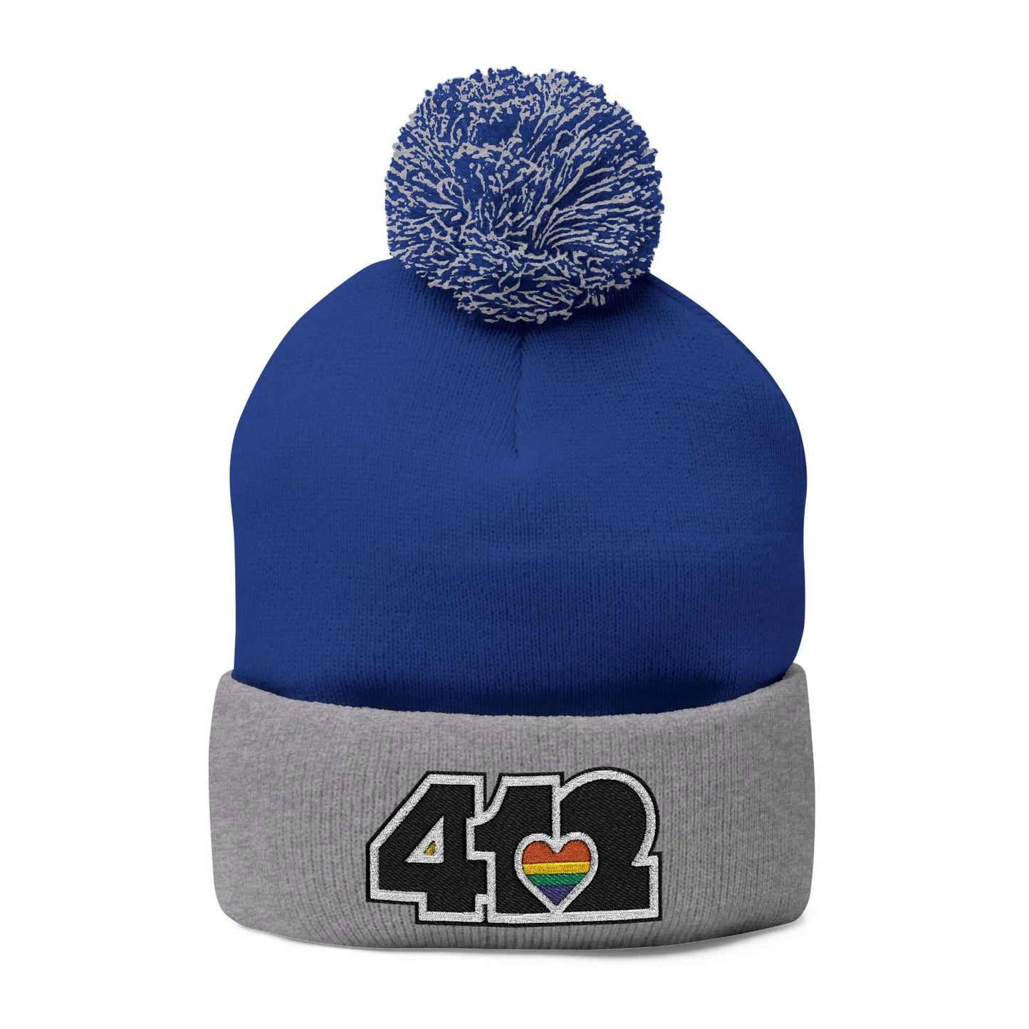 Cozy 412 Tossle Cap | Embroidered Black and Rainbow Logo. Apparel Color: Royal / Heather Grey. Has soft acrylic knit, fold-over cuff, and one-size fit for winter comfort.