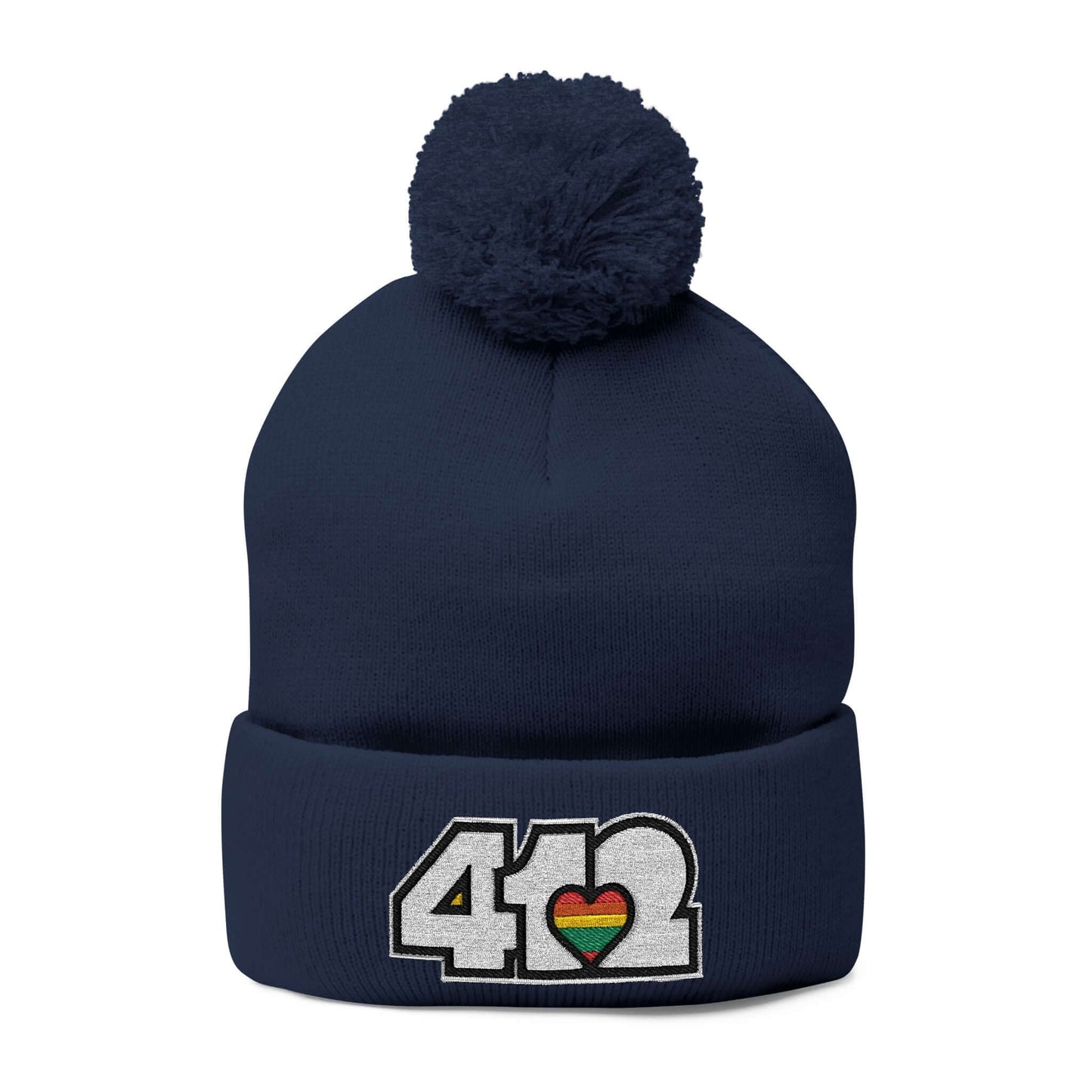 Cozy 412 Tossle Cap | Embroidered White and Rainbow Logo. Apparel Color: Navy. Has soft acrylic knit, fold-over cuff, and one-size fit for winter comfort.