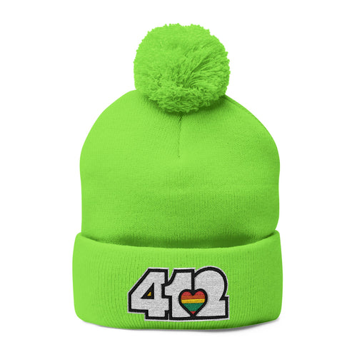 412 Tossle Cap | Embroidered White and Rainbow Logo. Apparel Color: Neon Green. Has soft acrylic knit, fold-over cuff, and one-size fit for winter comfort.