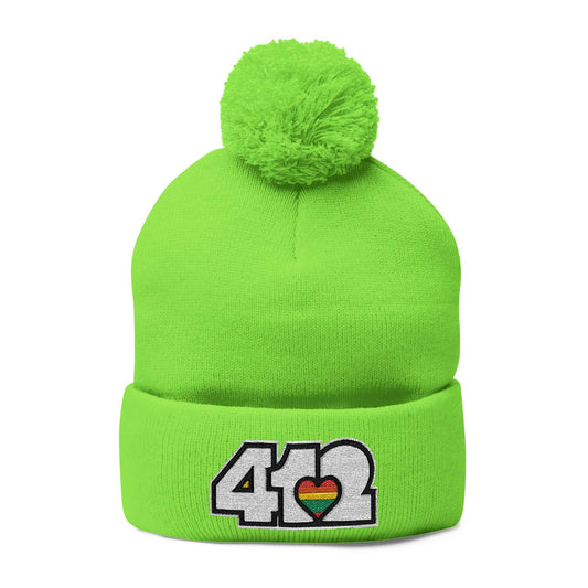 Cozy 412 Tossle Cap | Embroidered White and Rainbow Logo. Apparel Color: Neon Green. Has soft acrylic knit, fold-over cuff, and one-size fit for winter comfort.