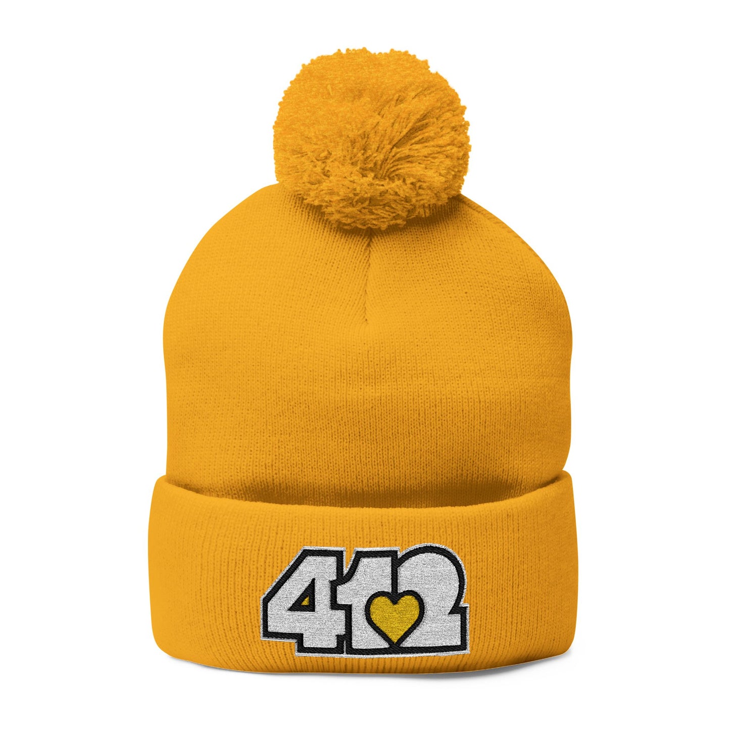 Cozy 412 Tossle Cap | Embroidered White and Yellow Logo. Apparel Color: Gold. Has soft acrylic knit, fold-over cuff, and one-size fit for winter comfort.