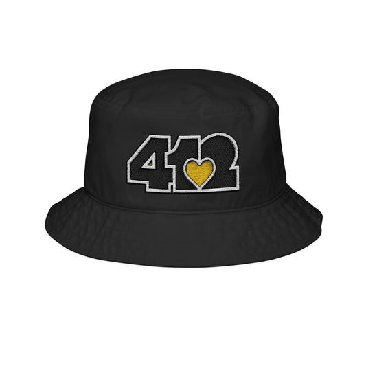 412 Black Gilligan Crown bucket hat with embroidered yellow heart and black 412 logo; vibrant Pittsburgh streetwear with a sunny, with a sunny, feel-good aesthetic.