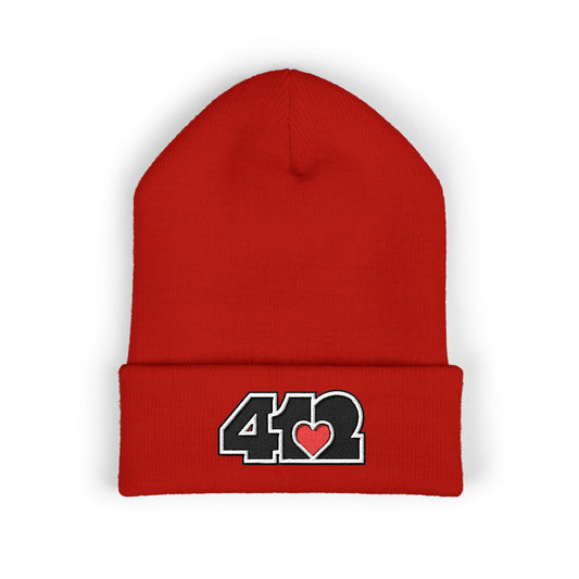 Red 412 Skull Crown beanie with black embroidered logo and red heart patch, blending Pittsburgh grit with royal symbolism.