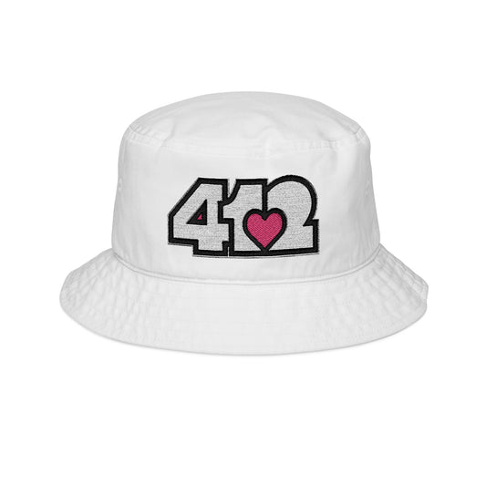 412 White Gilligan Crown bucket hat with embroidered pink heart and white 412 logo; playful Pittsburgh streetwear with bold contrast and community-driven energy.
