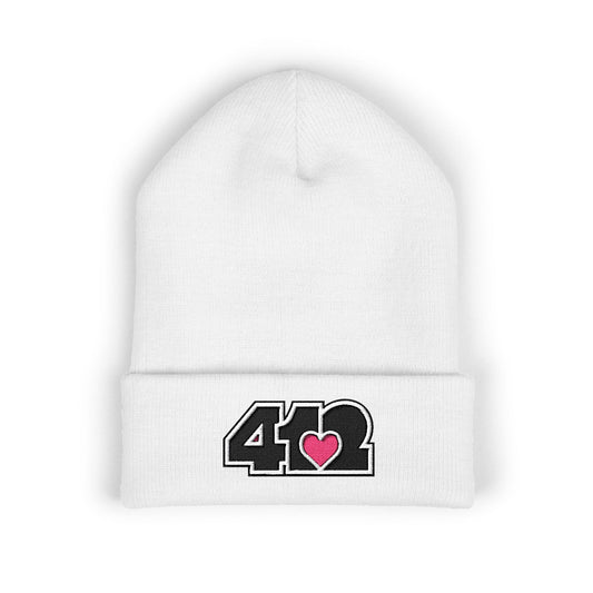 White 412 Skull Crown beanie with black embroidered logo and pink heart patch. Pittsburgh made fashion blending Three Rivers energy, and urban grit.