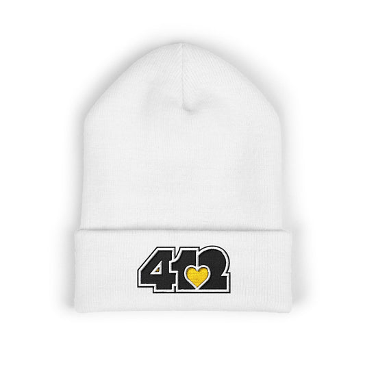 White 412 Skull Crown beanie with yellow embroidered heart and black logo, channeling Pittsburgh streetwear with regal edge and radiant contrast.