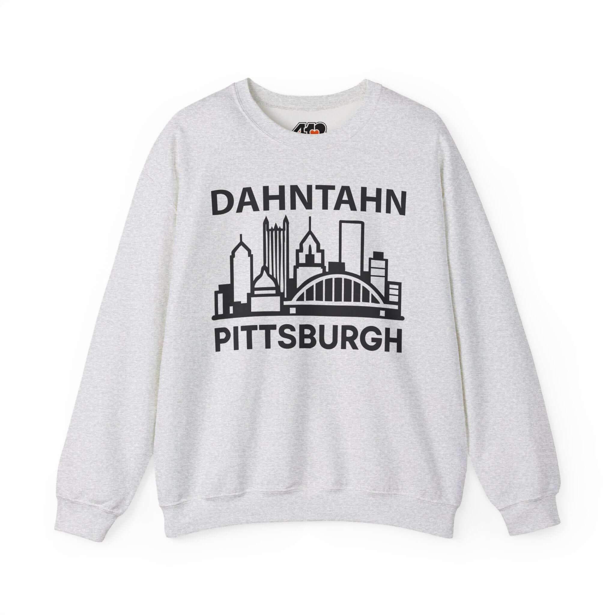 Dahntahn Pittsburgh Sweatshirt | Black Logo. Apparel Color: Ash. A blend of 50% cotton and 50% polyester for cozy durability. With an Elastic ribbed collar, and Double-needle stitching.