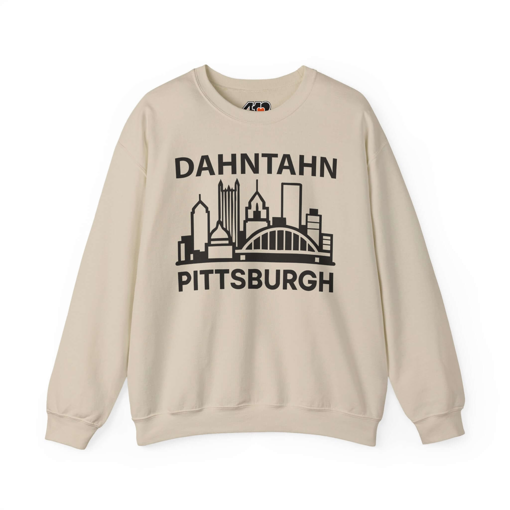 Dahntahn Pittsburgh Sweatshirt | Black Logo. Apparel Color: Sand. A blend of 50% cotton and 50% polyester for cozy durability. With an Elastic ribbed collar, and Double-needle stitching.
