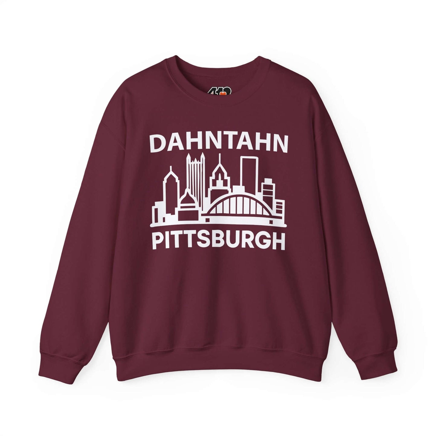 Dahntahn Pittsburgh Sweatshirt | White Logo. Apparel Color: Maroon. A blend of 50% cotton and 50% polyester for cozy durability. With an Elastic ribbed collar, and Double-needle stitching.