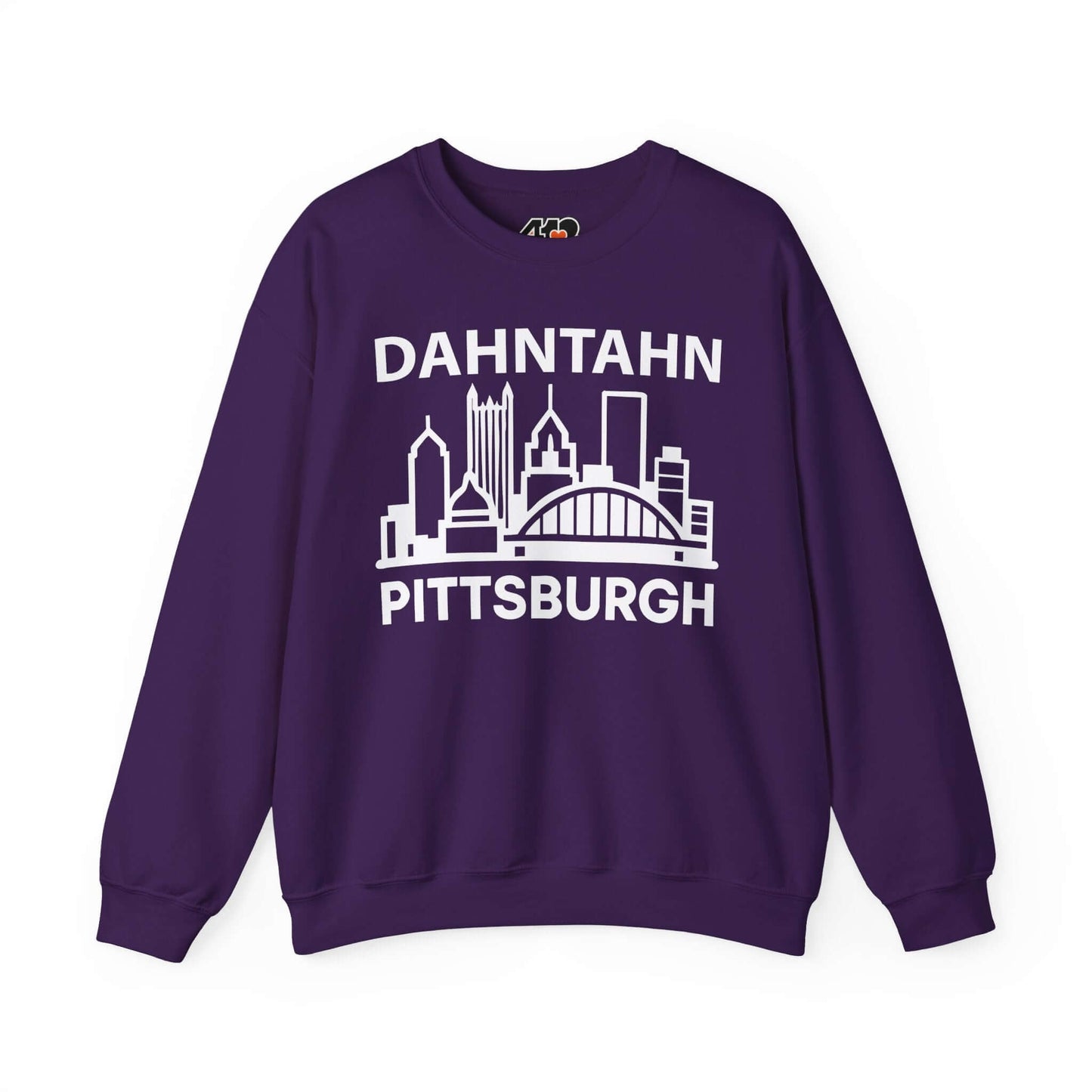 Dahntahn Pittsburgh Sweatshirt | White Logo. Apparel Color: Purple. A blend of 50% cotton and 50% polyester for cozy durability. With an Elastic ribbed collar, and Double-needle stitching.