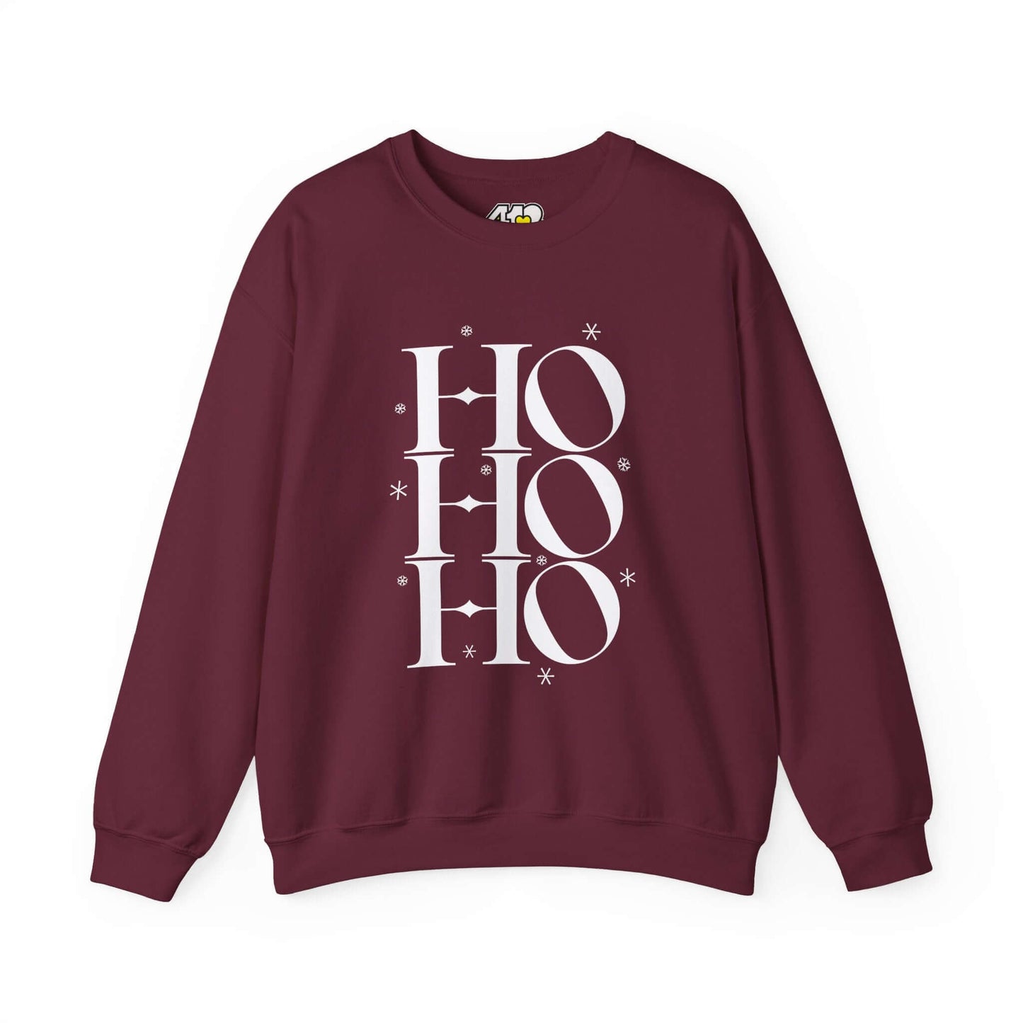 HO HO HO Sweatshirt | Bold White Logo. Apparel Color: Maroon. A blend of 50% cotton and 50% polyester for cozy durability. With an Elastic ribbed collar, and Double-needle stitching.