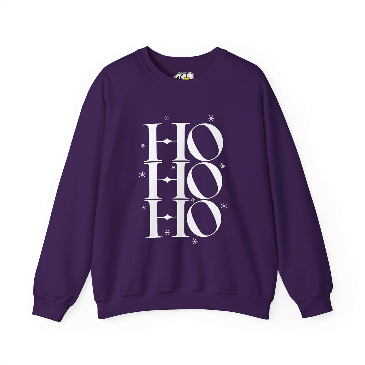 HO HO HO Sweatshirt | Bold White Logo. Apparel Color: Purple. A blend of 50% cotton and 50% polyester for cozy durability. With an Elastic ribbed collar, and Double-needle stitching.