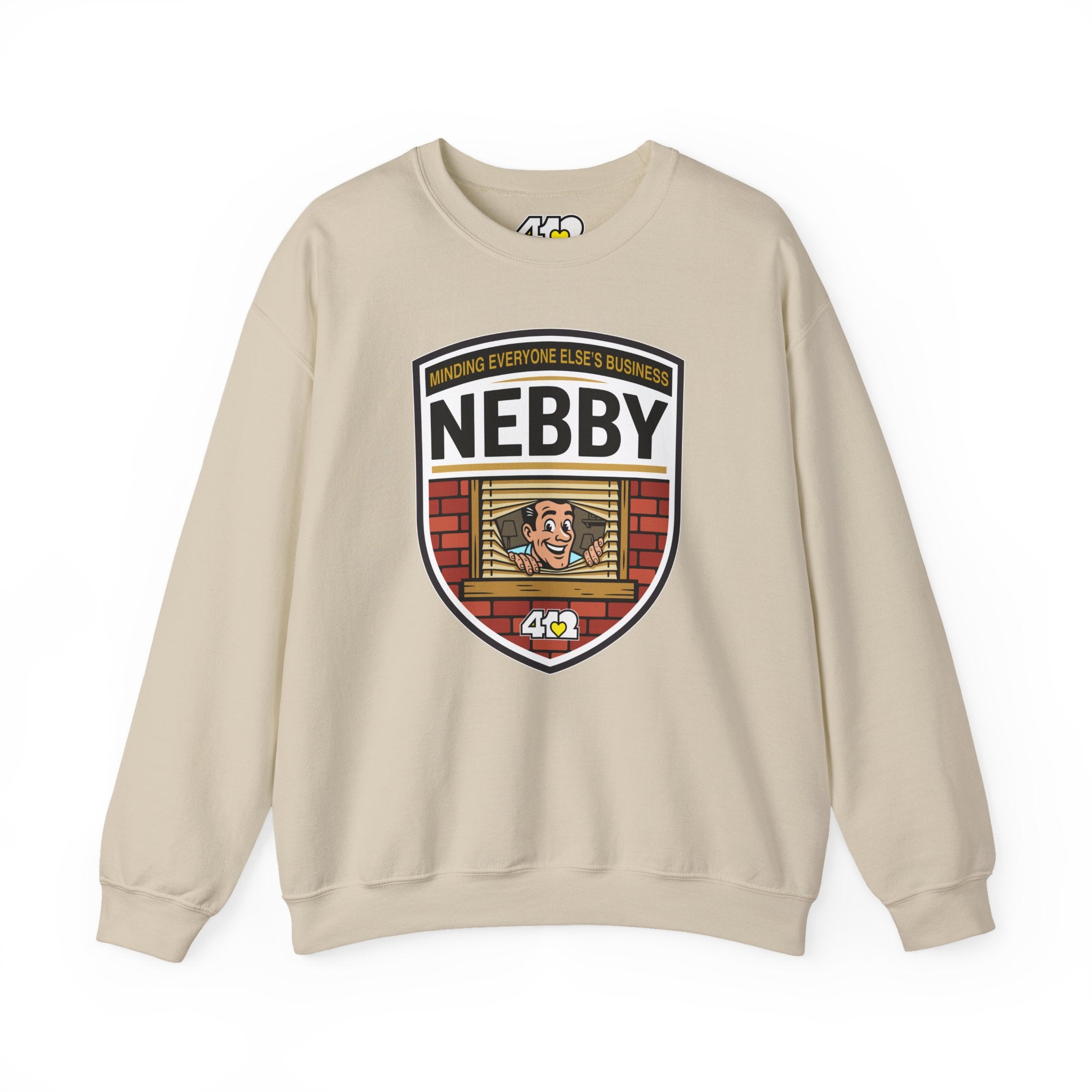 NEBBY Crewneck. Apparel Color: Sand. A blend of 50% cotton and 50% polyester for cozy durability. With an Elastic ribbed collar, and Double-needle stitching.
