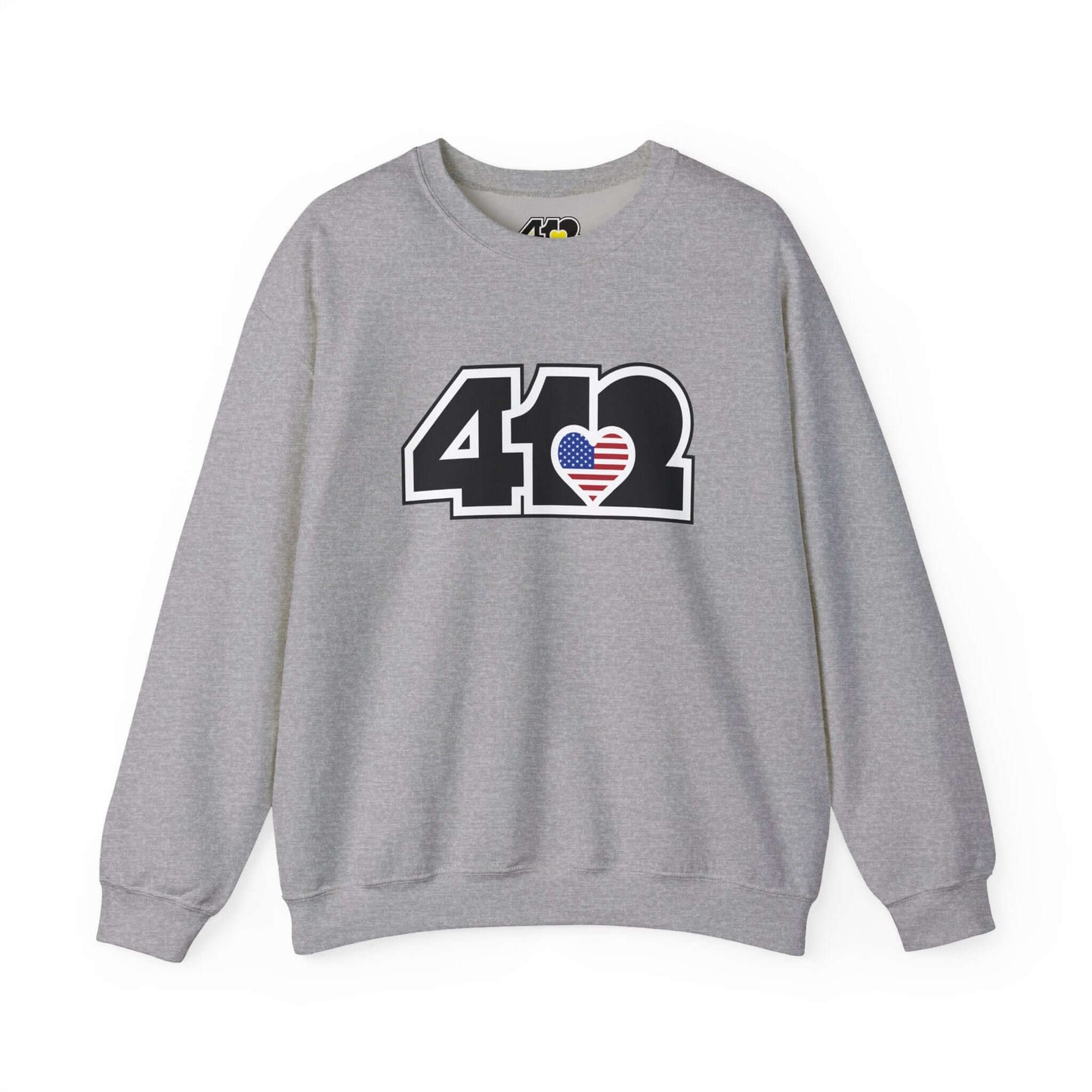 Pittsburgh Crewneck Sweatshirt | Black Stars & Stripes 412 Logo. Apparel Color: Sport Grey. A blend of 50% cotton and 50% polyester for cozy durability. With an Elastic ribbed collar, and Double-needle stitching.