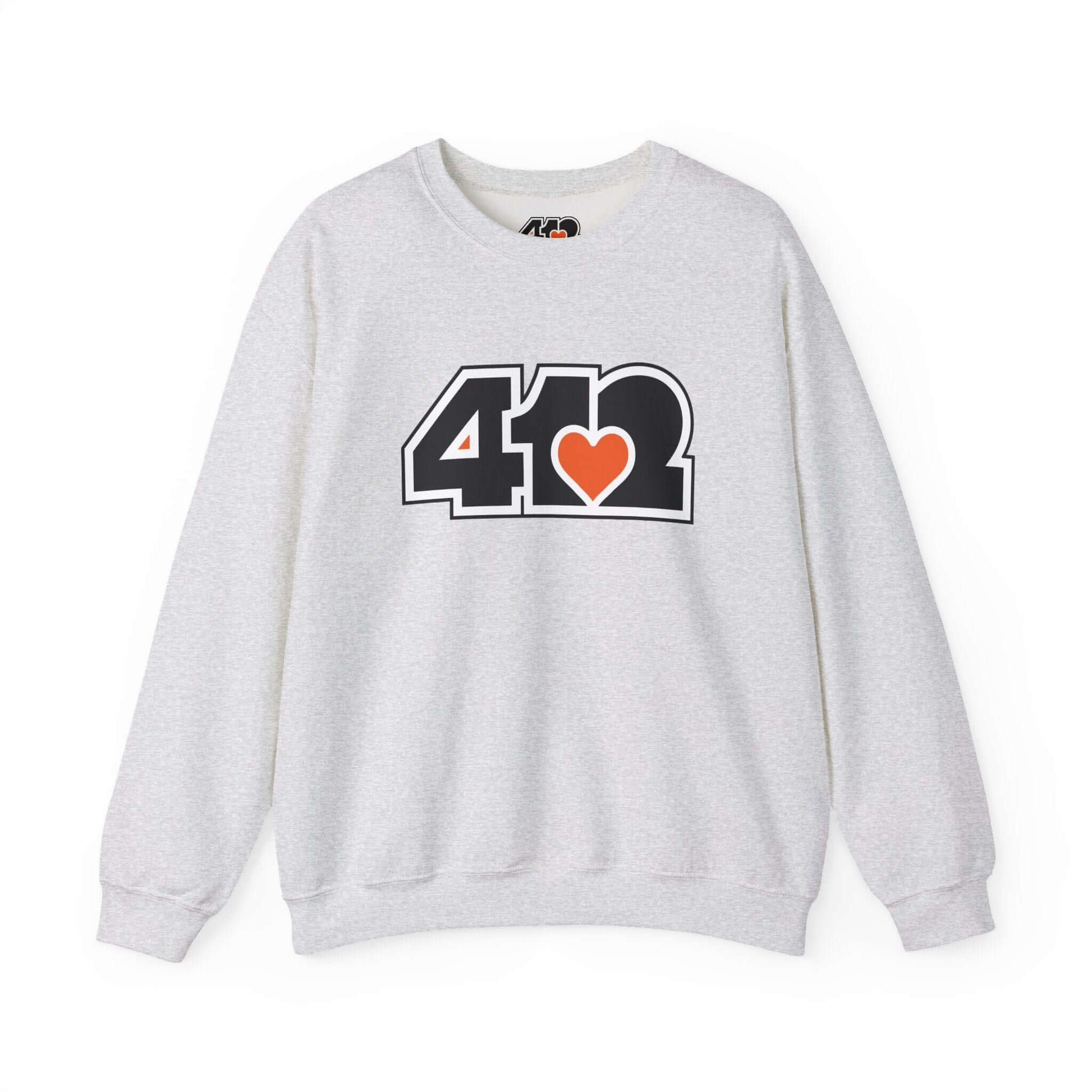 Pittsburgh Crewneck Sweatshirt | Black and Orange 412 Logo. Apparel Color: Ash. A blend of 50% cotton and 50% polyester for cozy durability. With an Elastic ribbed collar, and Double-needle stitching.