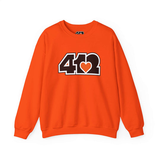Pittsburgh Crewneck Sweatshirt | Black and Orange 412 Logo. Apparel Color: Orange. A blend of 50% cotton and 50% polyester for cozy durability. With an Elastic ribbed collar, and Double-needle stitching.