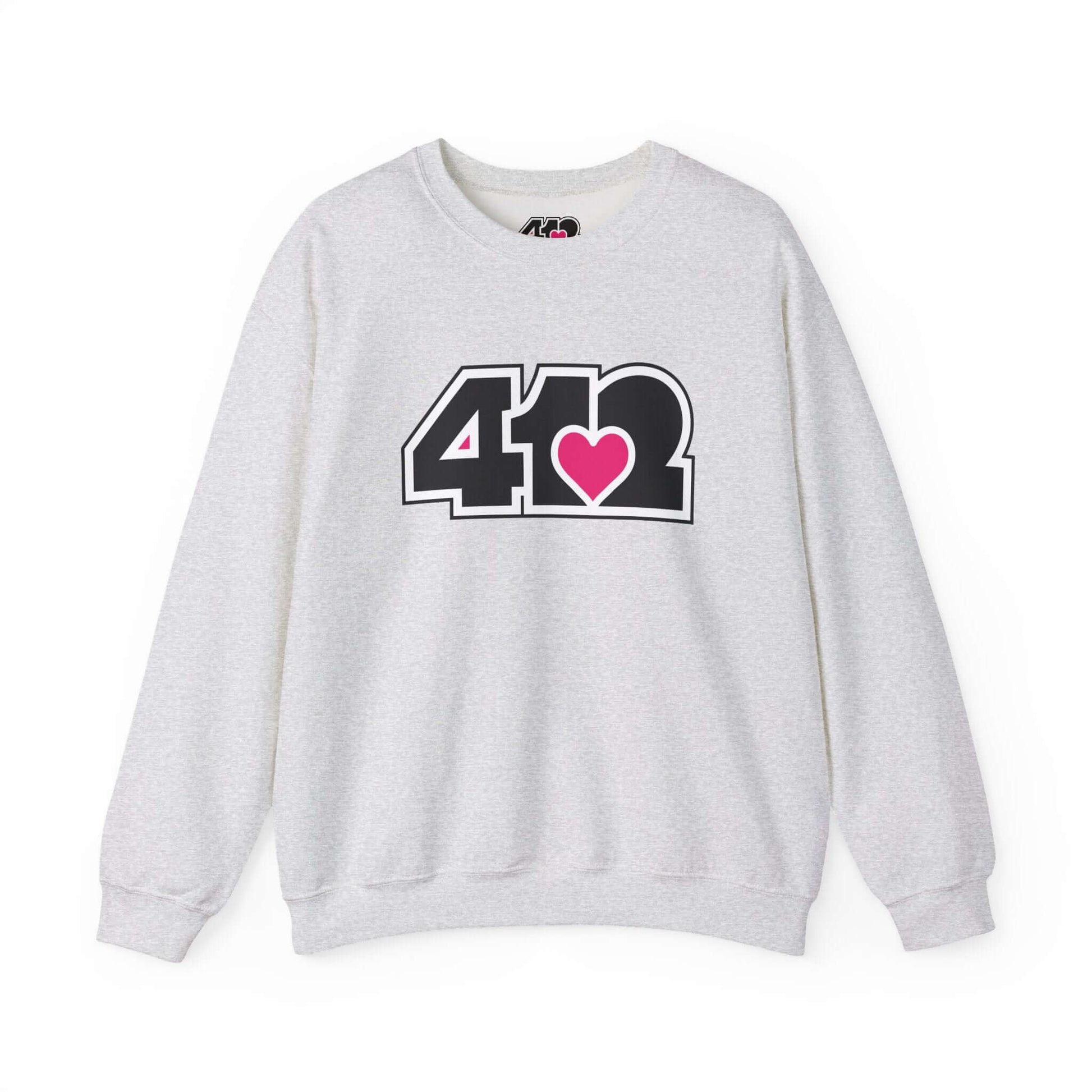 Pittsburgh Crewneck Sweatshirt | Black and Pink 412 Logo. Apparel Color: Ash. A blend of 50% cotton and 50% polyester for cozy durability. With an Elastic ribbed collar, and Double-needle stitching.