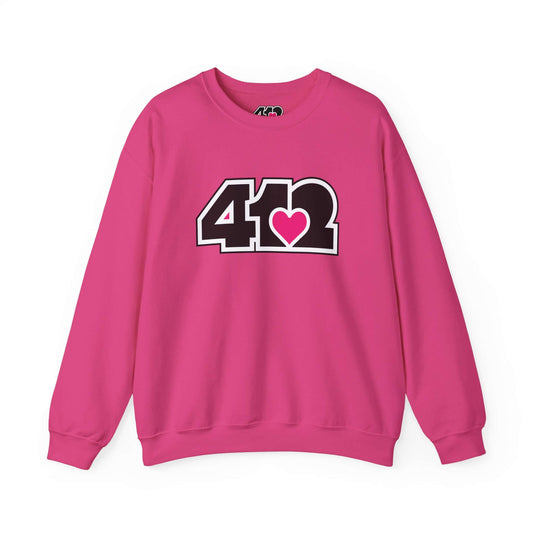 Pittsburgh Crewneck Sweatshirt | Black and Pink 412 Logo. Apparel Color: Heliconia. A blend of 50% cotton and 50% polyester for cozy durability. With an Elastic ribbed collar, and Double-needle stitching.