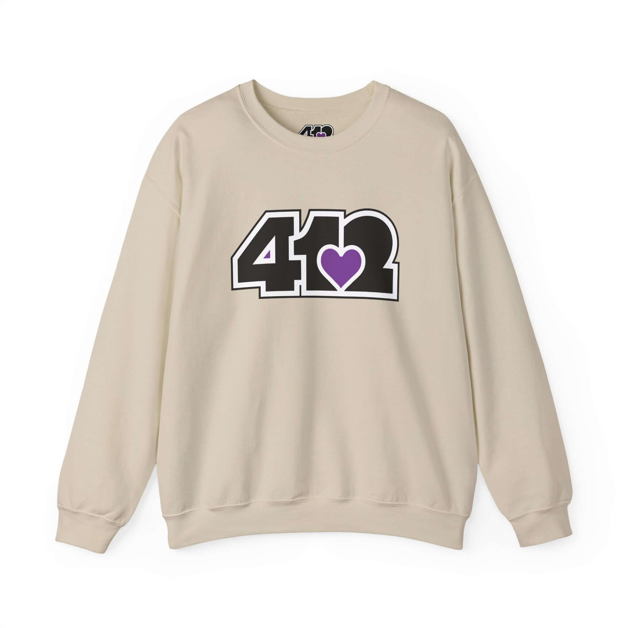 Pittsburgh Crewneck Sweatshirt | Black and Purple 412 Logo. Apparel Color: Sand. A blend of 50% cotton and 50% polyester for cozy durability. With an Elastic ribbed collar, and Double-needle stitching.