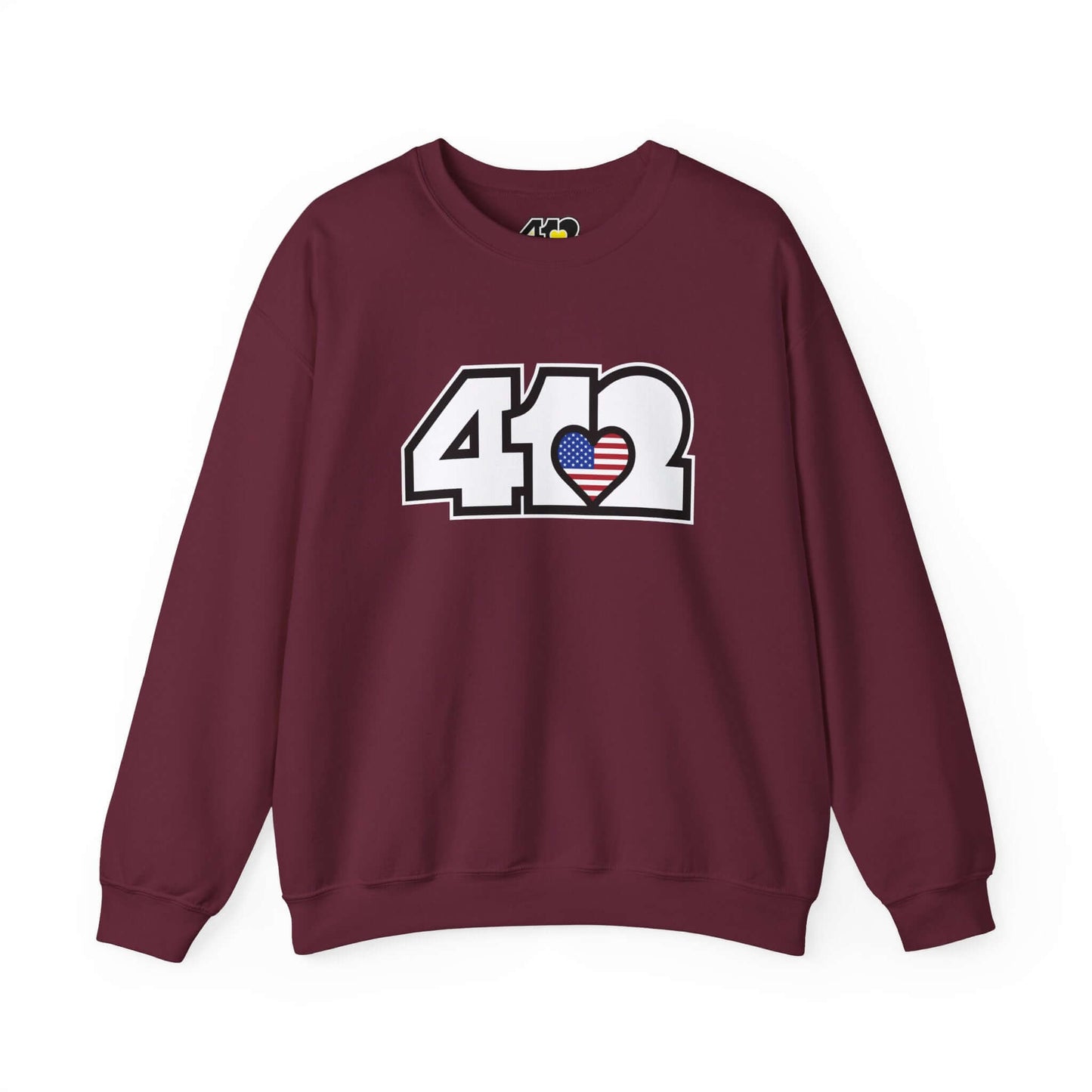 Pittsburgh Crewneck Sweatshirt | White Stars & Stripes 412 Logo. Apparel Color: Maroon. A blend of 50% cotton and 50% polyester for cozy durability. With an Elastic ribbed collar, and Double-needle stitching.