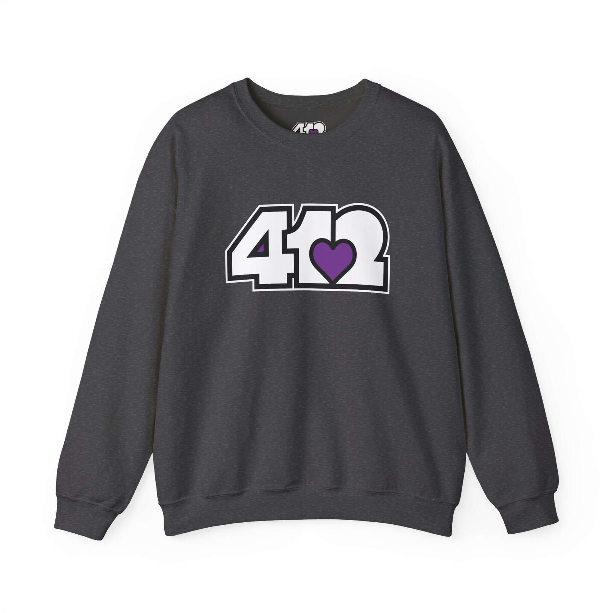 Pittsburgh Crewneck Sweatshirt | White and Purple 412 Logo. Apparel Color: Dark Heather. A blend of 50% cotton and 50% polyester for cozy durability. With an Elastic ribbed collar, and Double-needle stitching.