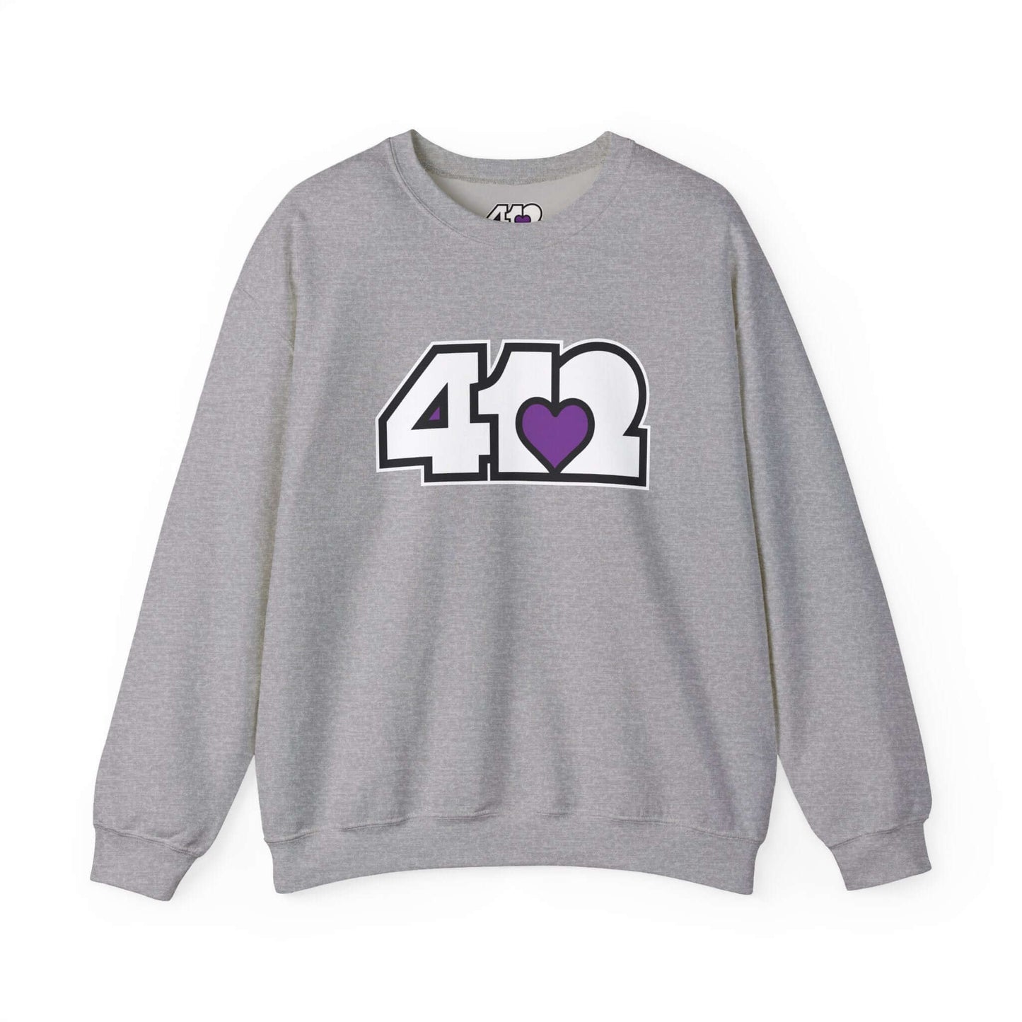 Pittsburgh Crewneck Sweatshirt | White and Purple 412 Logo. Apparel Color: Sport Grey. A blend of 50% cotton and 50% polyester for cozy durability. With an Elastic ribbed collar, and Double-needle stitching.