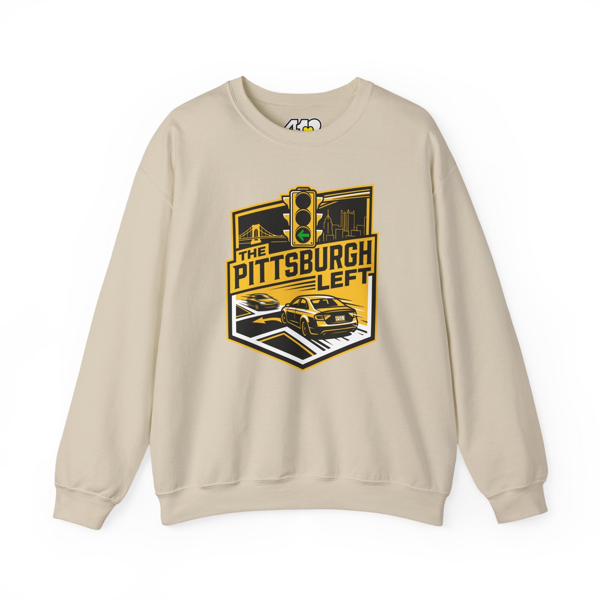 Pittsburgh Left Crewneck. Apparel Color: Sand. A blend of 50% cotton and 50% polyester for cozy durability. With an Elastic ribbed collar, and Double-needle stitching.