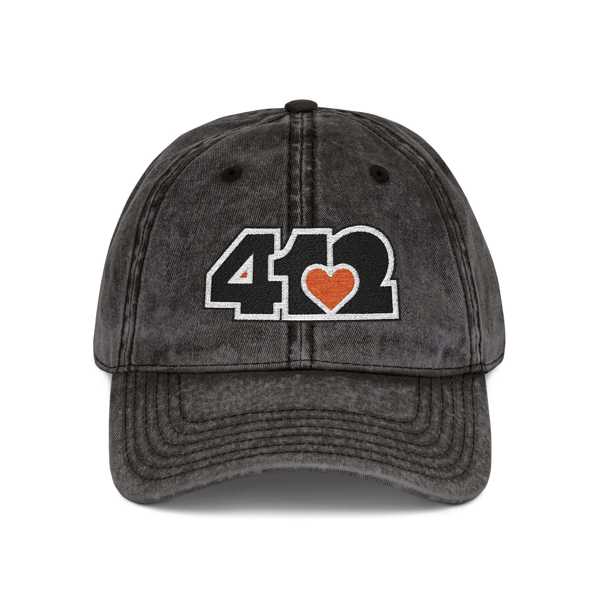 Pittsburgh Vintage Hat | Embroidered Black and Orange 412 Logo. Apparel Color: Black. A relaxed fit, cotton twill fabric, adjustable buckle, and washed-out finish look.