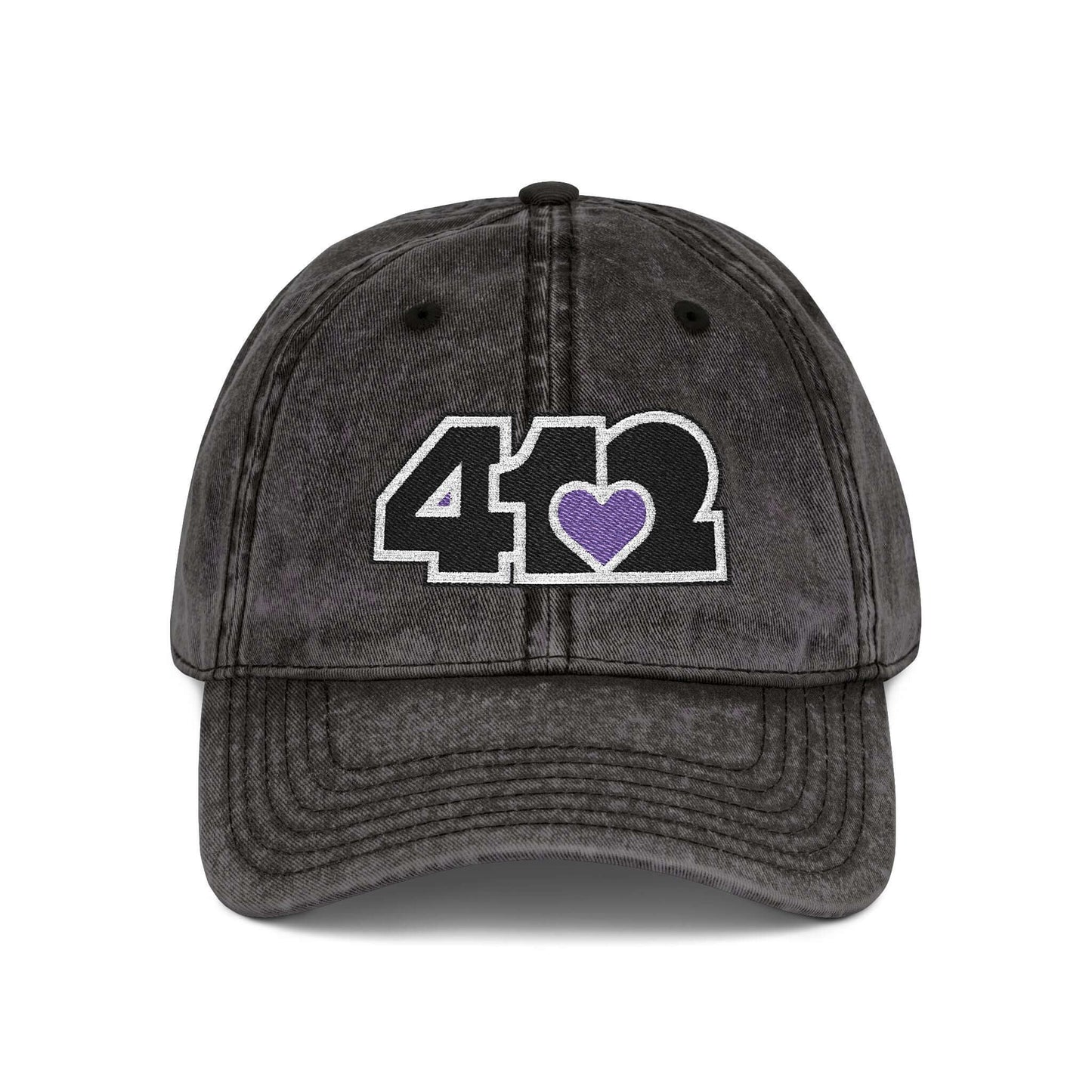Pittsburgh Vintage Hat | Embroidered Black and Purple 412 Logo. Apparel Color: Black. A relaxed fit, cotton twill fabric, adjustable buckle, and washed-out finish look.