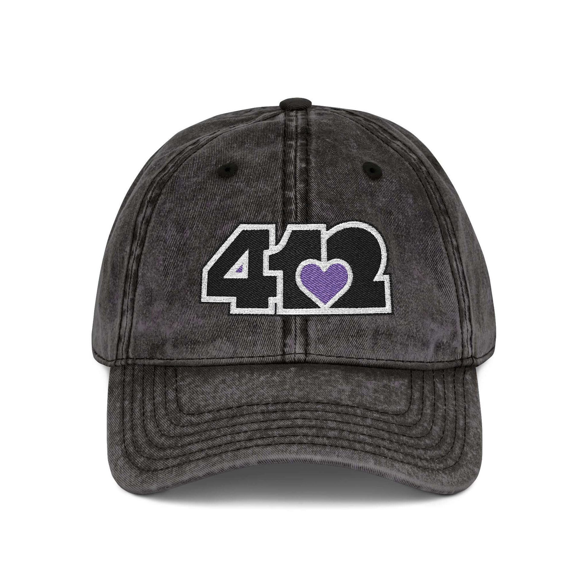 Pittsburgh Vintage Hat | Embroidered Black and Purple 412 Logo. Apparel Color: Black. A relaxed fit, cotton twill fabric, adjustable buckle, and washed-out finish look.