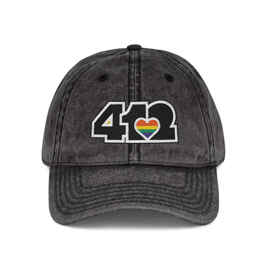 Pittsburgh Vintage Hat | Embroidered Black and Rainbow 412 Logo. Apparel Color: Black. A relaxed fit, cotton twill fabric, adjustable buckle, and washed-out finish look.