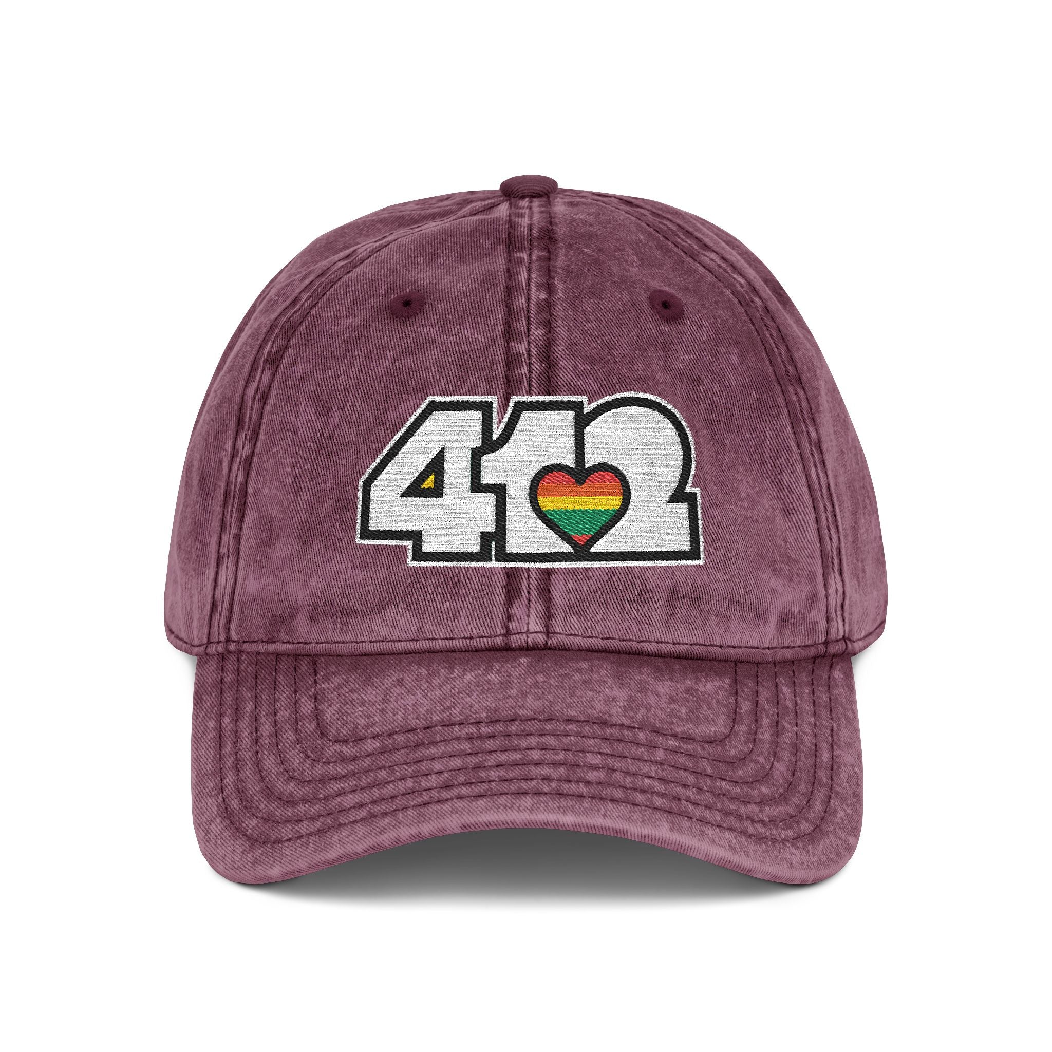 Pittsburgh Vintage Hat | Embroidered White and Rainbow 412 Logo. Apparel Color: Maroon. A relaxed fit, cotton twill fabric, adjustable buckle, and washed-out finish look.