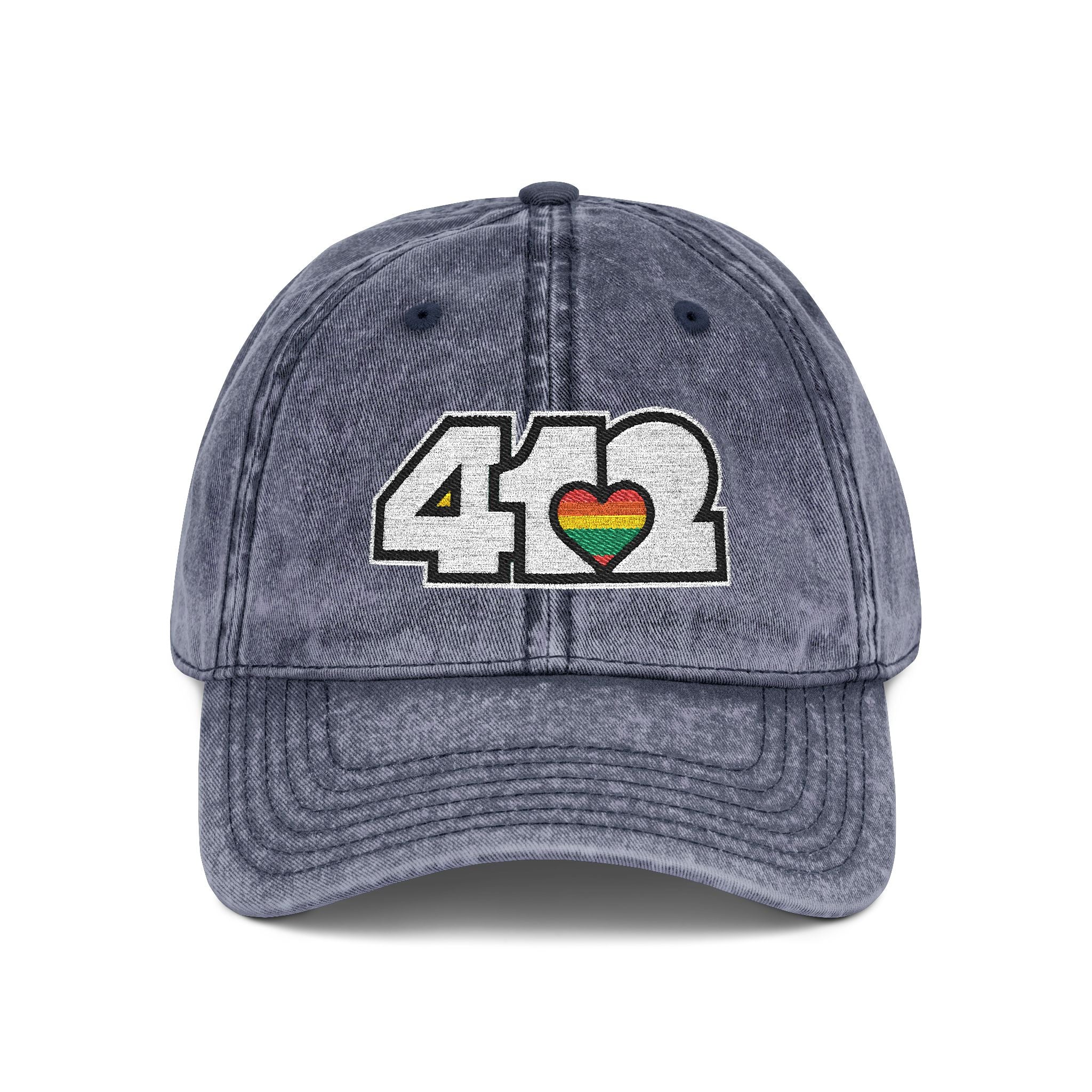 Pittsburgh Vintage Hat | Embroidered White and Rainbow 412 Logo. Apparel Color: Navy. A relaxed fit, cotton twill fabric, adjustable buckle, and washed-out finish look.